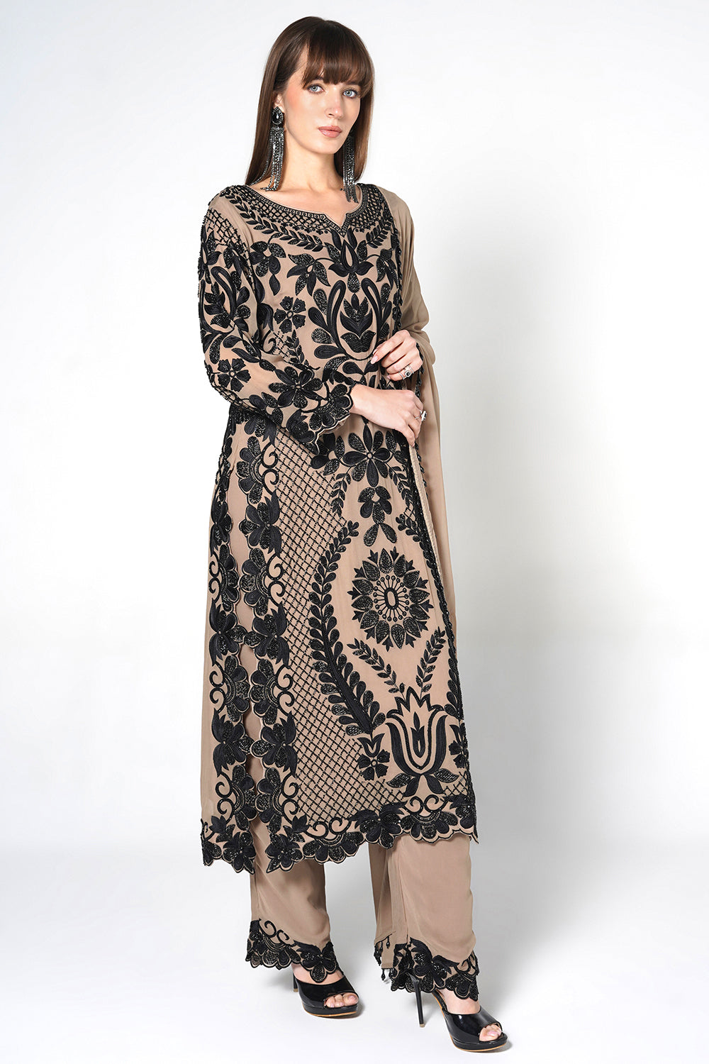 Peach Georgette Kurta Set Featuring Intricate Black Embroidery And Sheer Dupatta