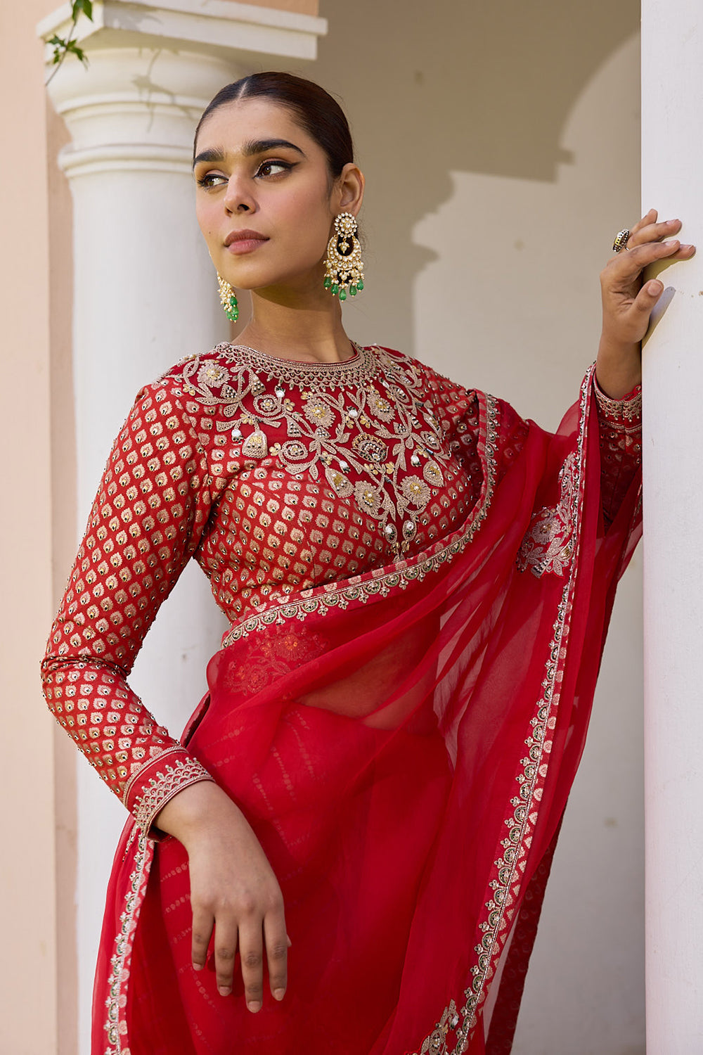 Red pure organza saree with embroidered blouse and jacquard under skirt