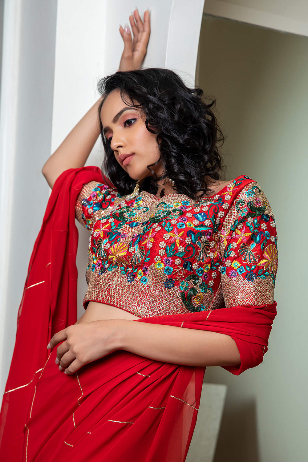 Red kali saree with embroidered blouse