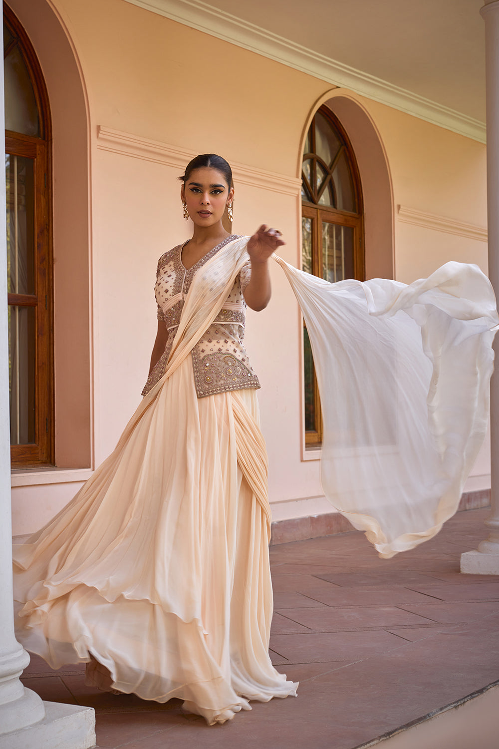 White pre draped lehenga saree with embroidered jacket