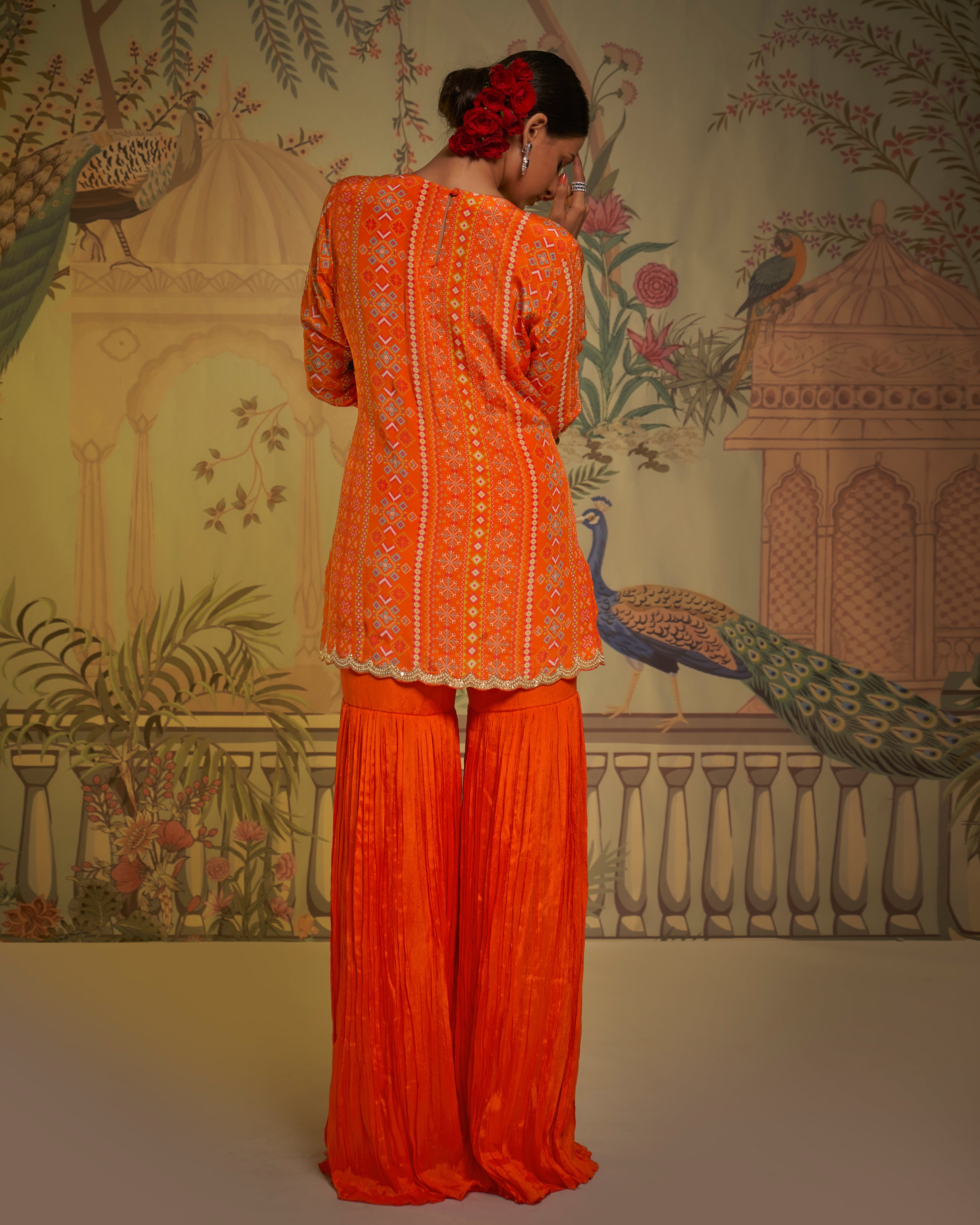 CY Aayushi Maniar Orange Crepe Silk Patola Print Tunic Gharara Set Back 1