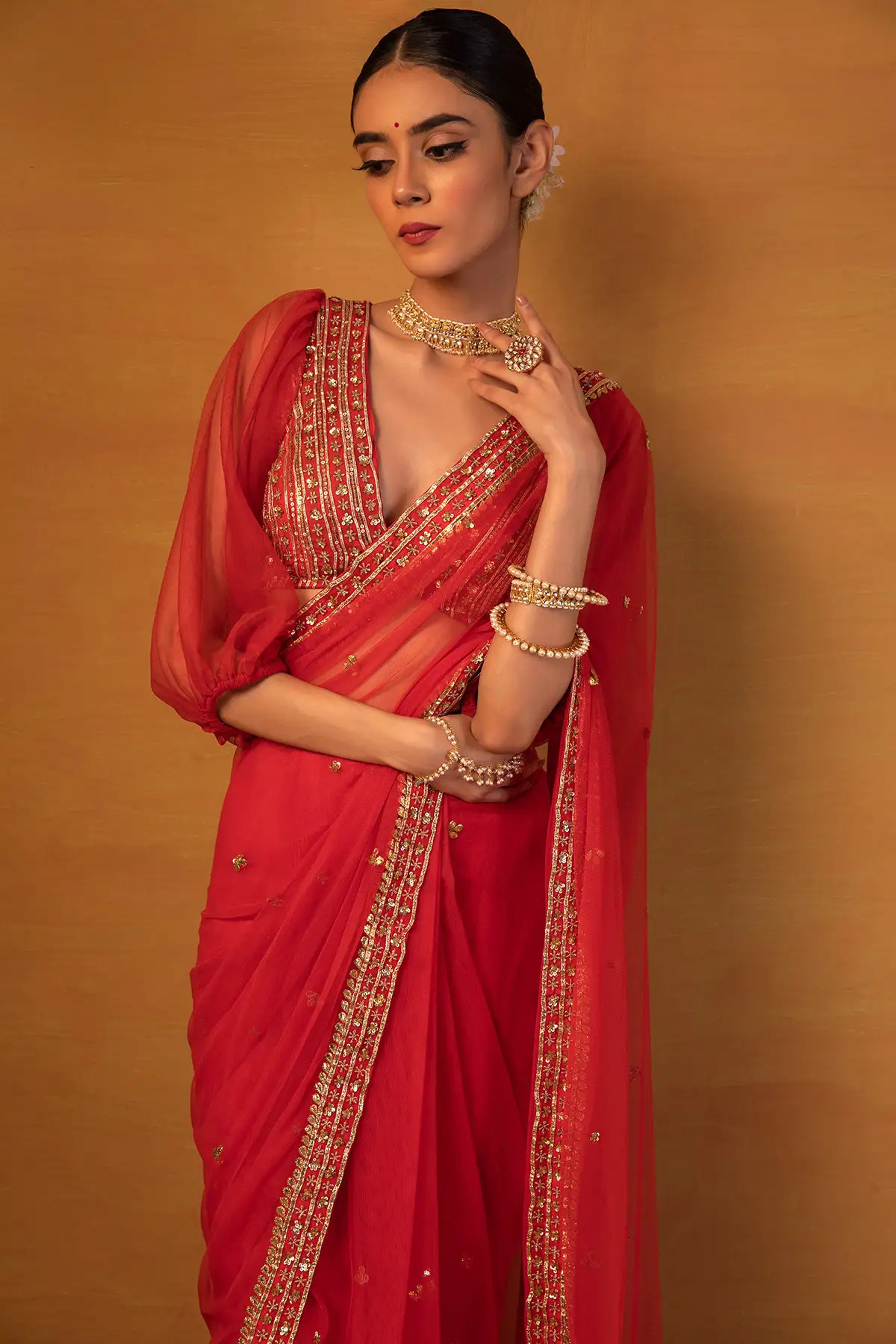 Esha Koul - Orange Net Saree Set