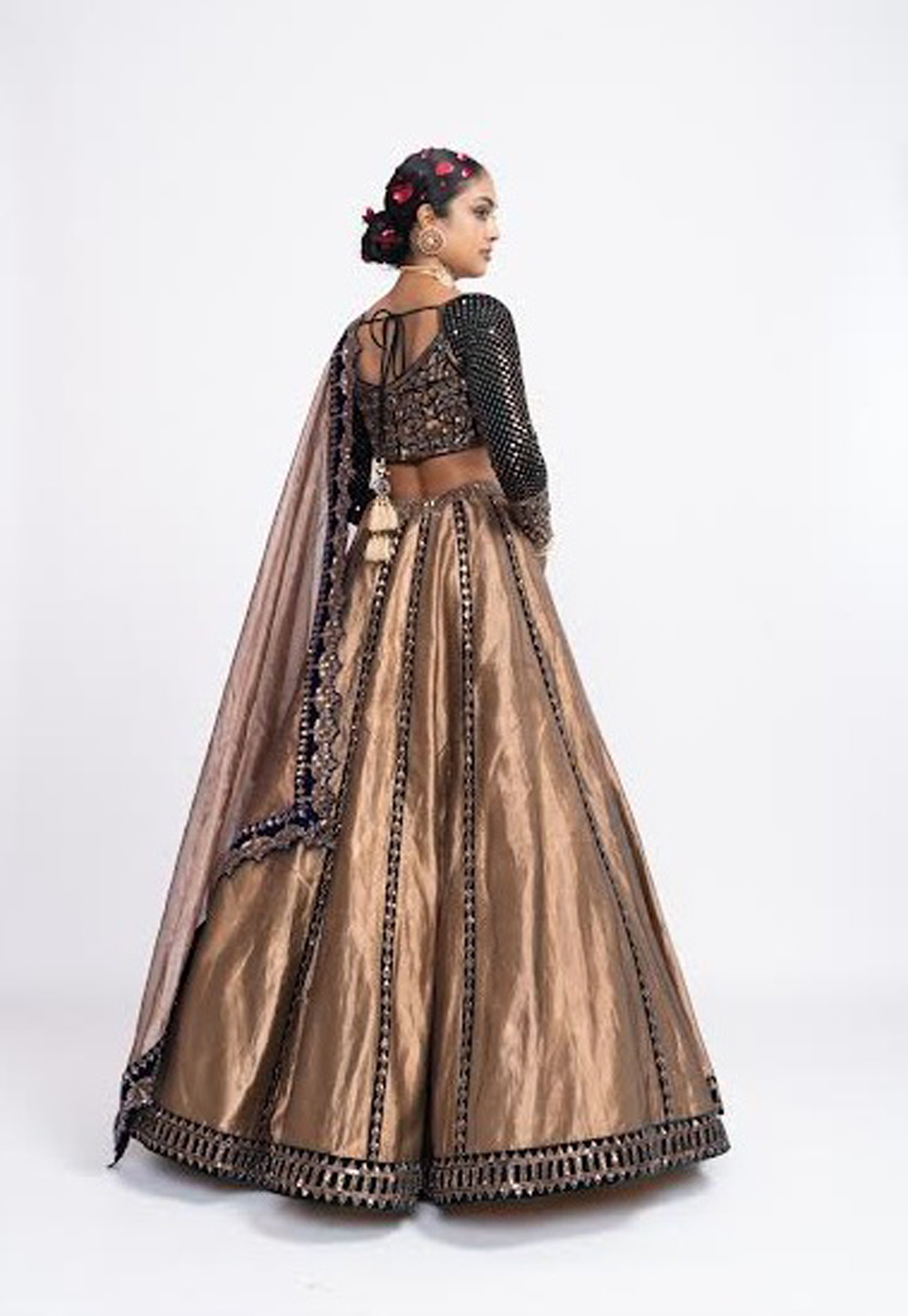 Vvani Vats - Deep Green Copper Tissue Lehenga Set