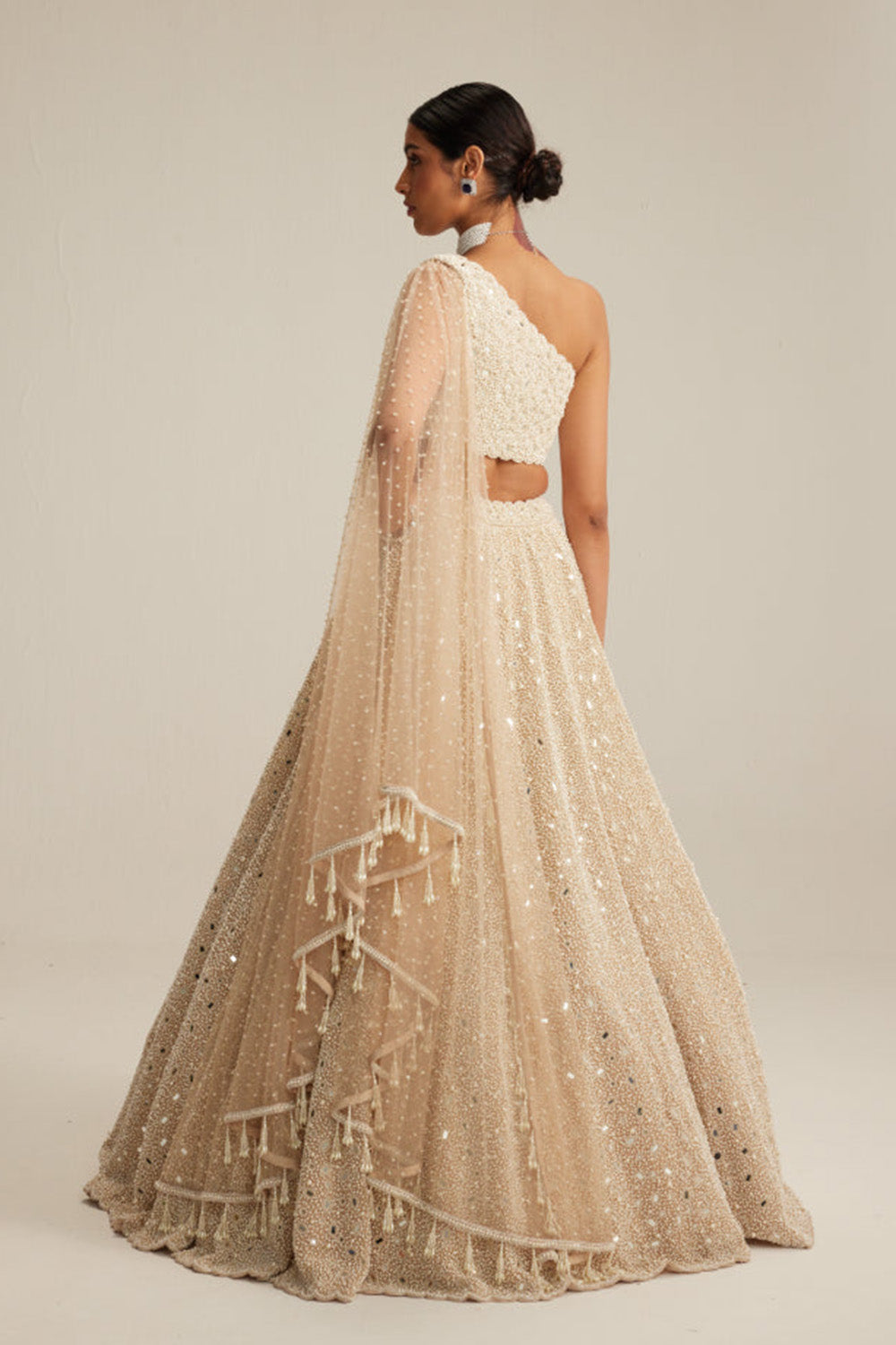 Light Beige Dense mirror and pearl one shoulder lehenga set