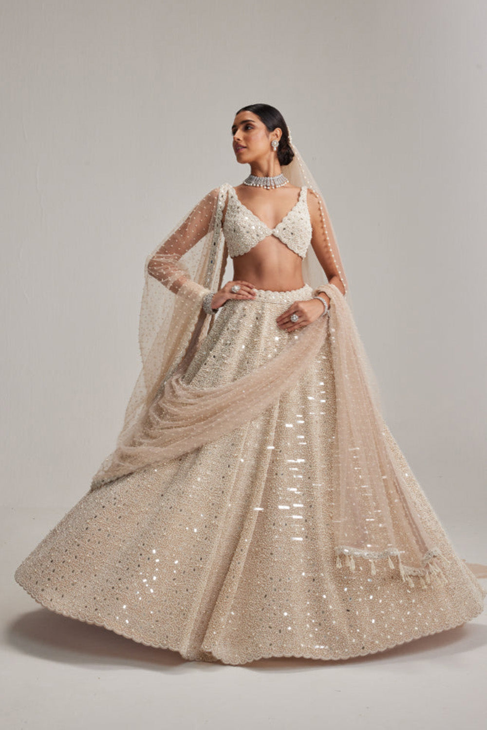 Light Beige Dense mirror and pearl lehenga set with Double Dupatta and Veil