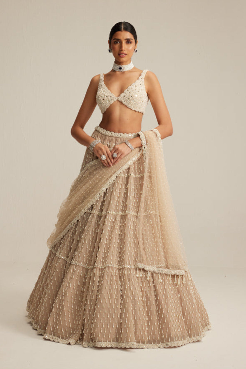 Light Beige Pearl Drop Multi Tier Lehenga Set.