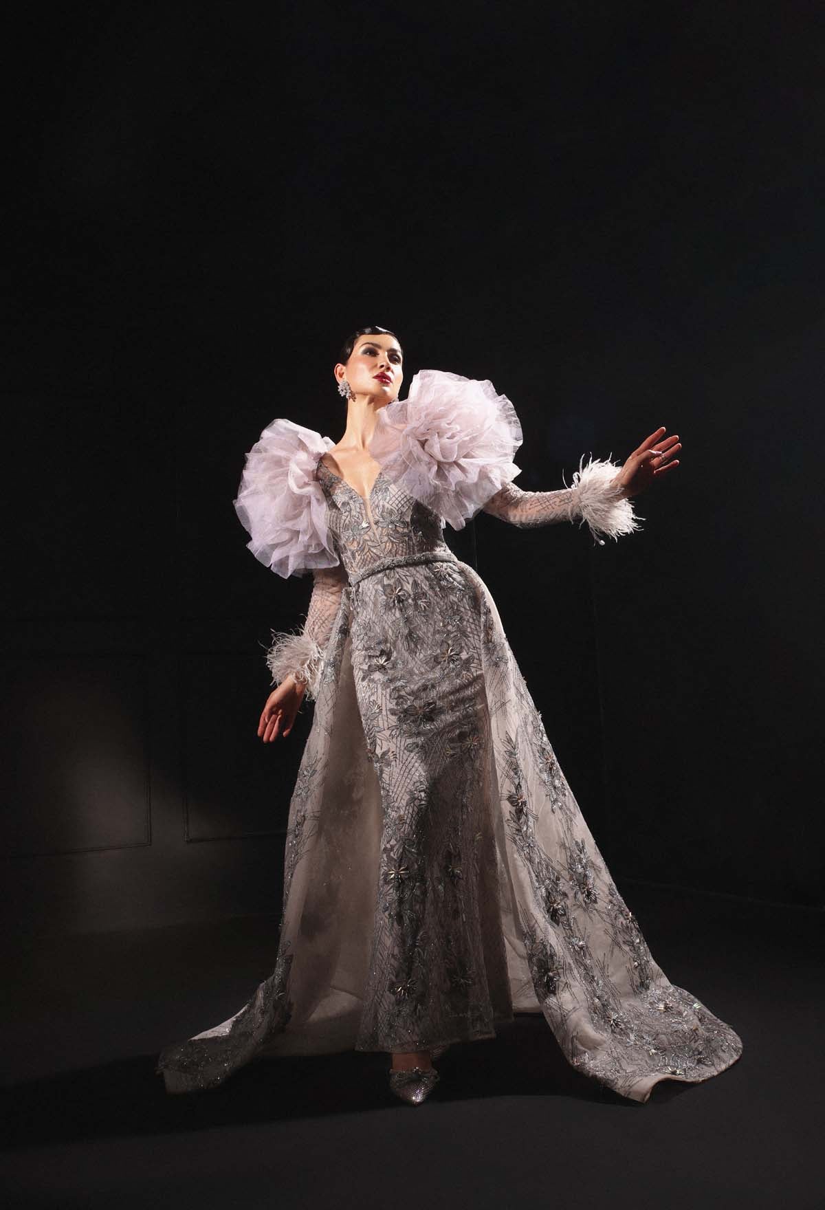 Exquisite Hand-Embroidered Grey Gown with Feathers and Ruffled Cape