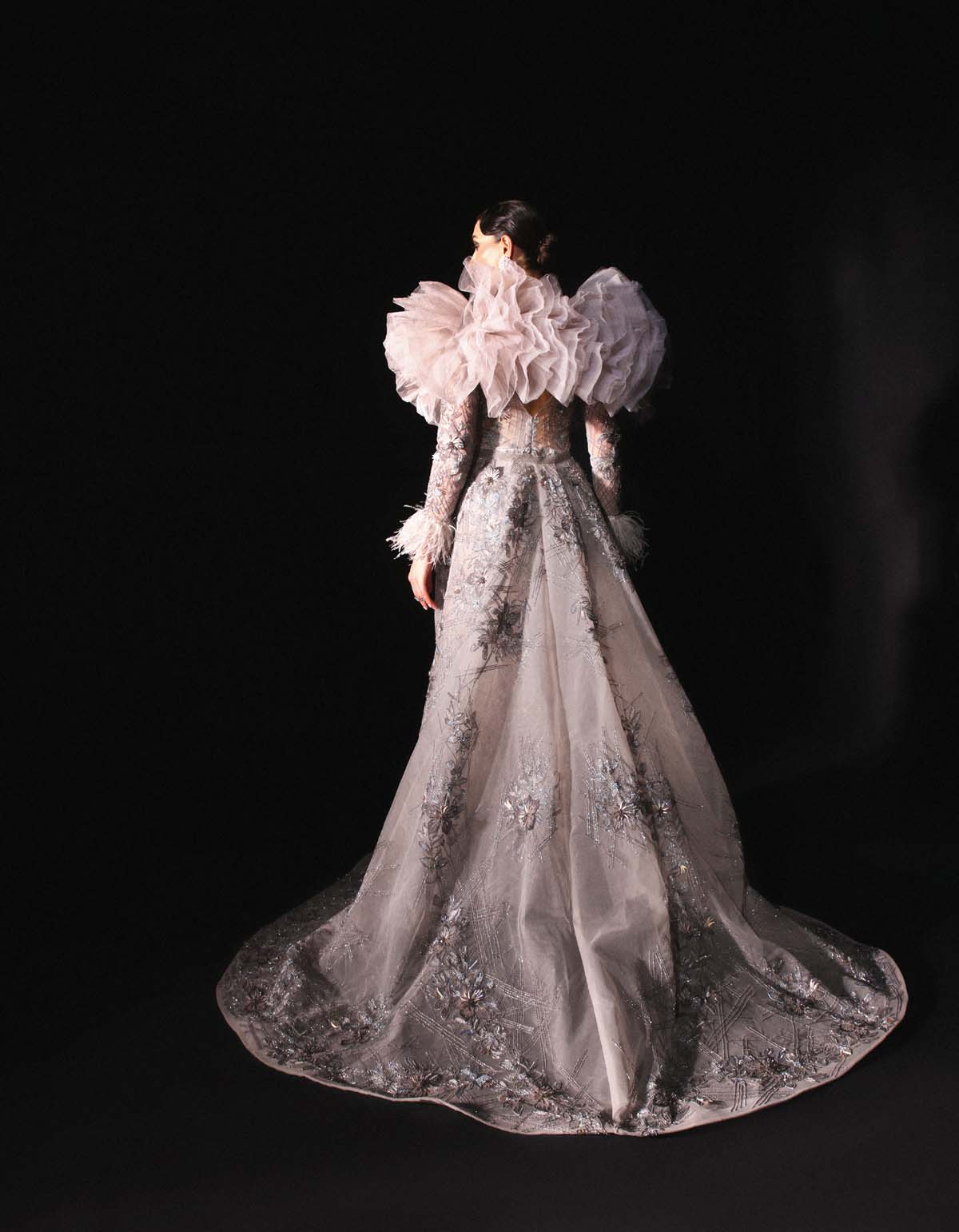 Exquisite Hand-Embroidered Grey Gown with Feathers and Ruffled Cape