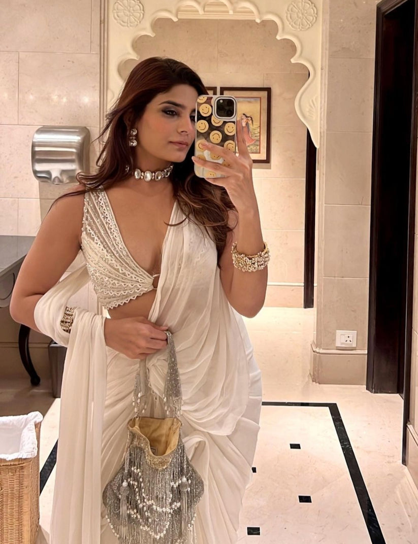 CY A Clutch Story Fringy Chic Hand Embroidered Potli 1