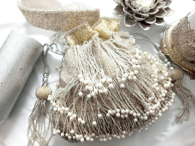 CY A Clutch Story Fringy Chic Hand Embroidered Potli Front 2