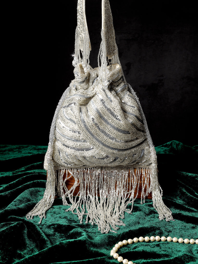 CY A Clutch Story Platinum Lux Potli Front 1