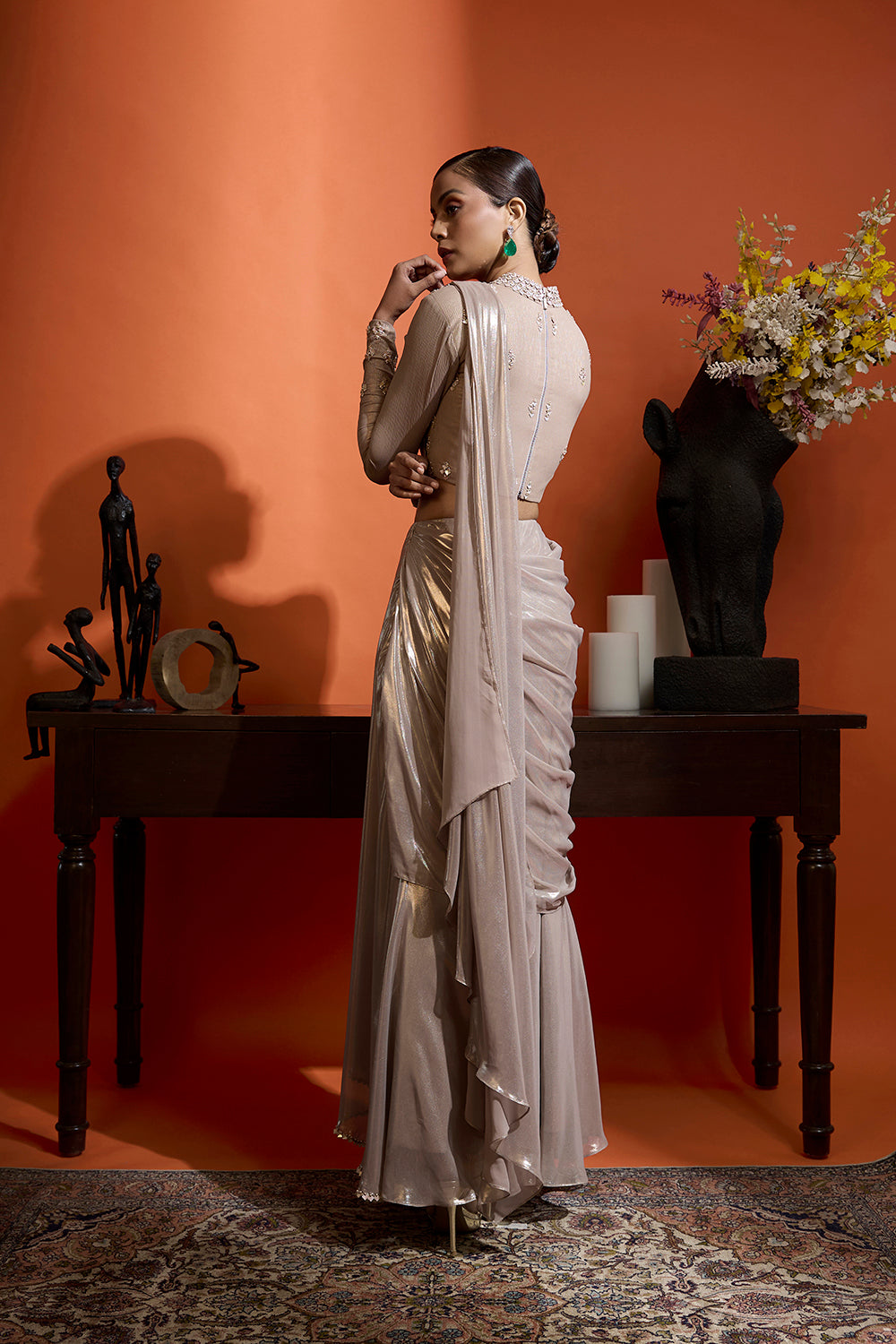 Champagne Gold Drape Saree Coupled with a Beaded Blouse