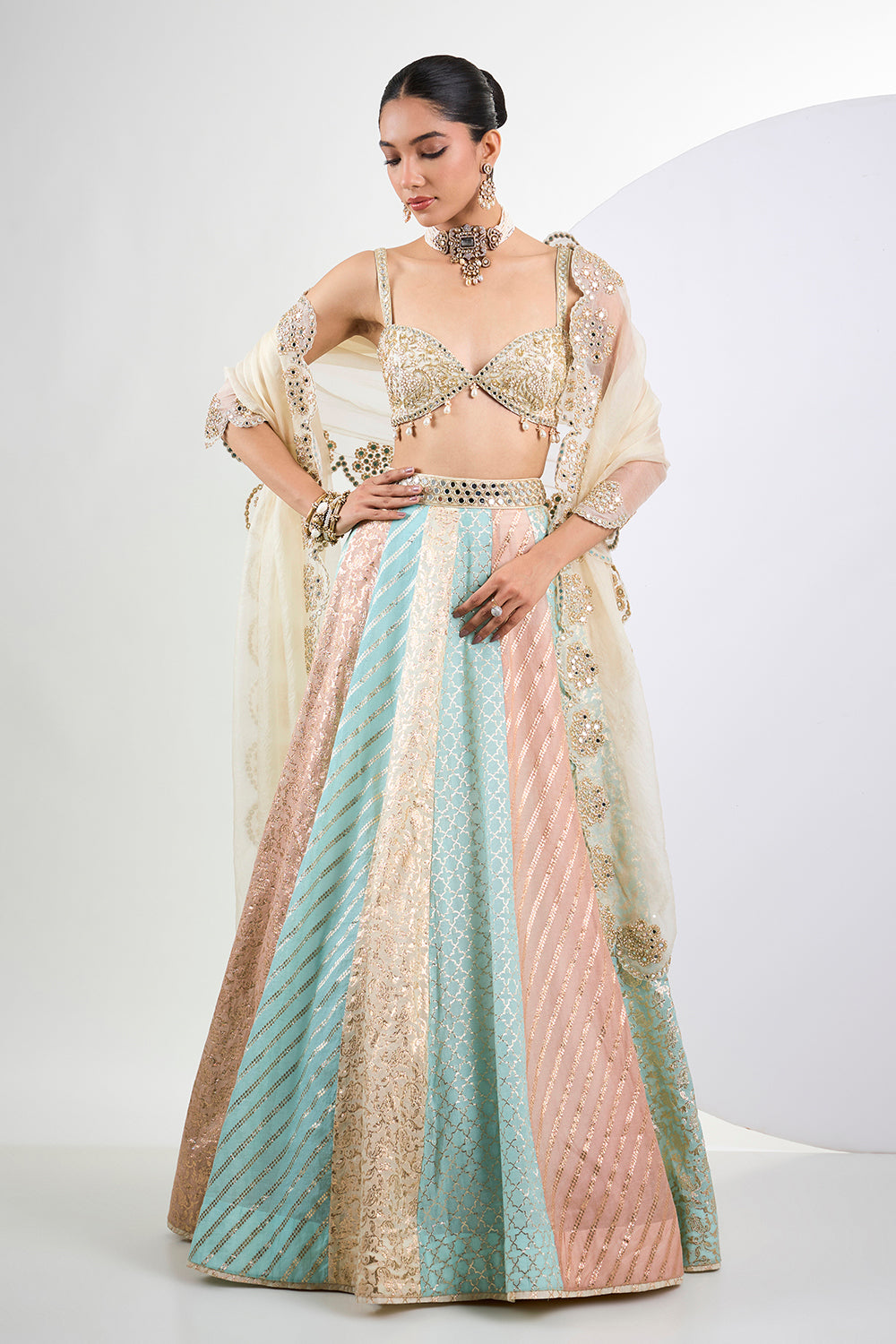 Ivory hand embroidered blouse with Banarasi navrang lehenga and mirror work organza Dupatta