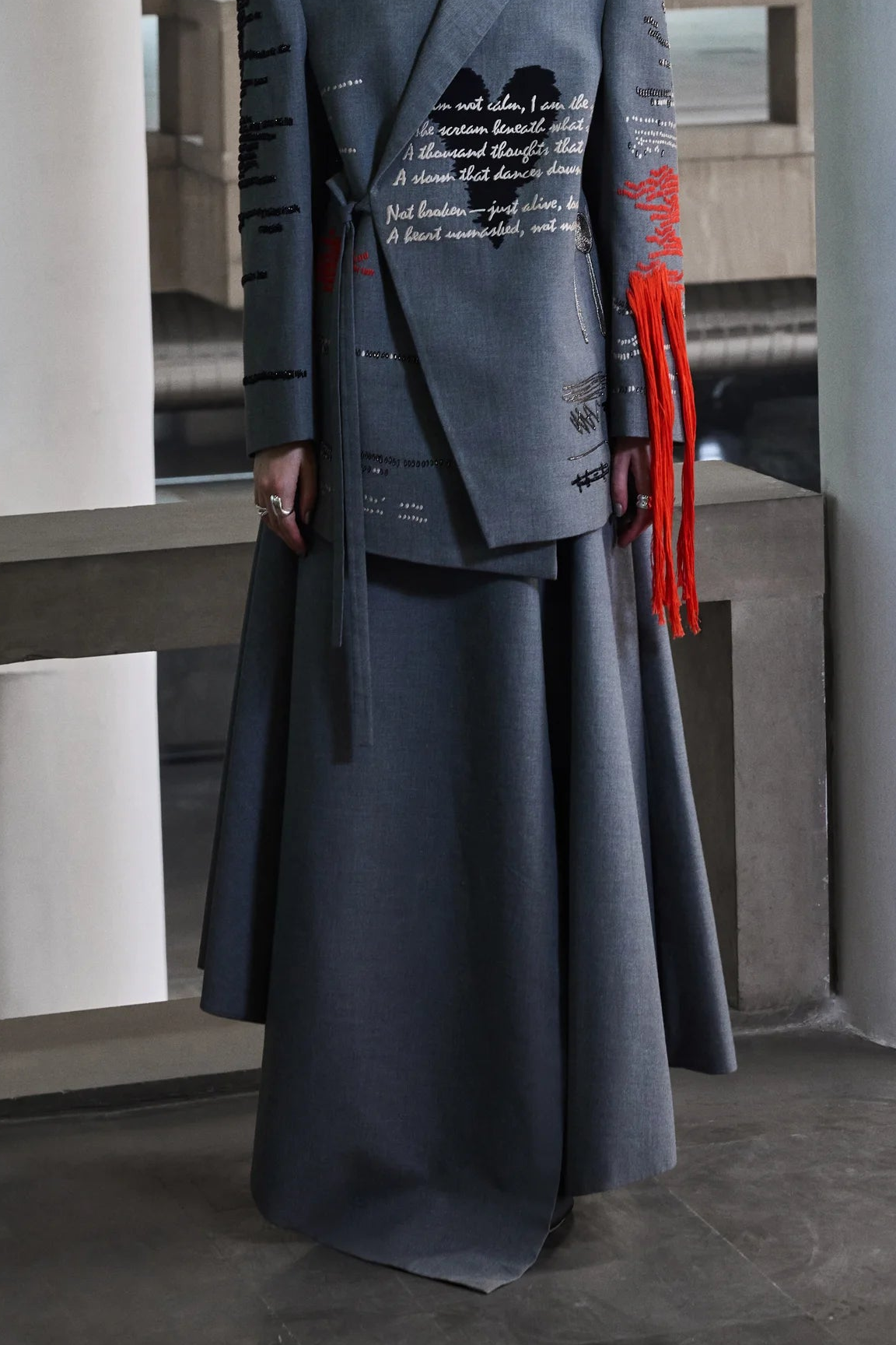 ASYMMETRIC DRAPED SKIRT OF ( CUTLERY WRAP JACKET )