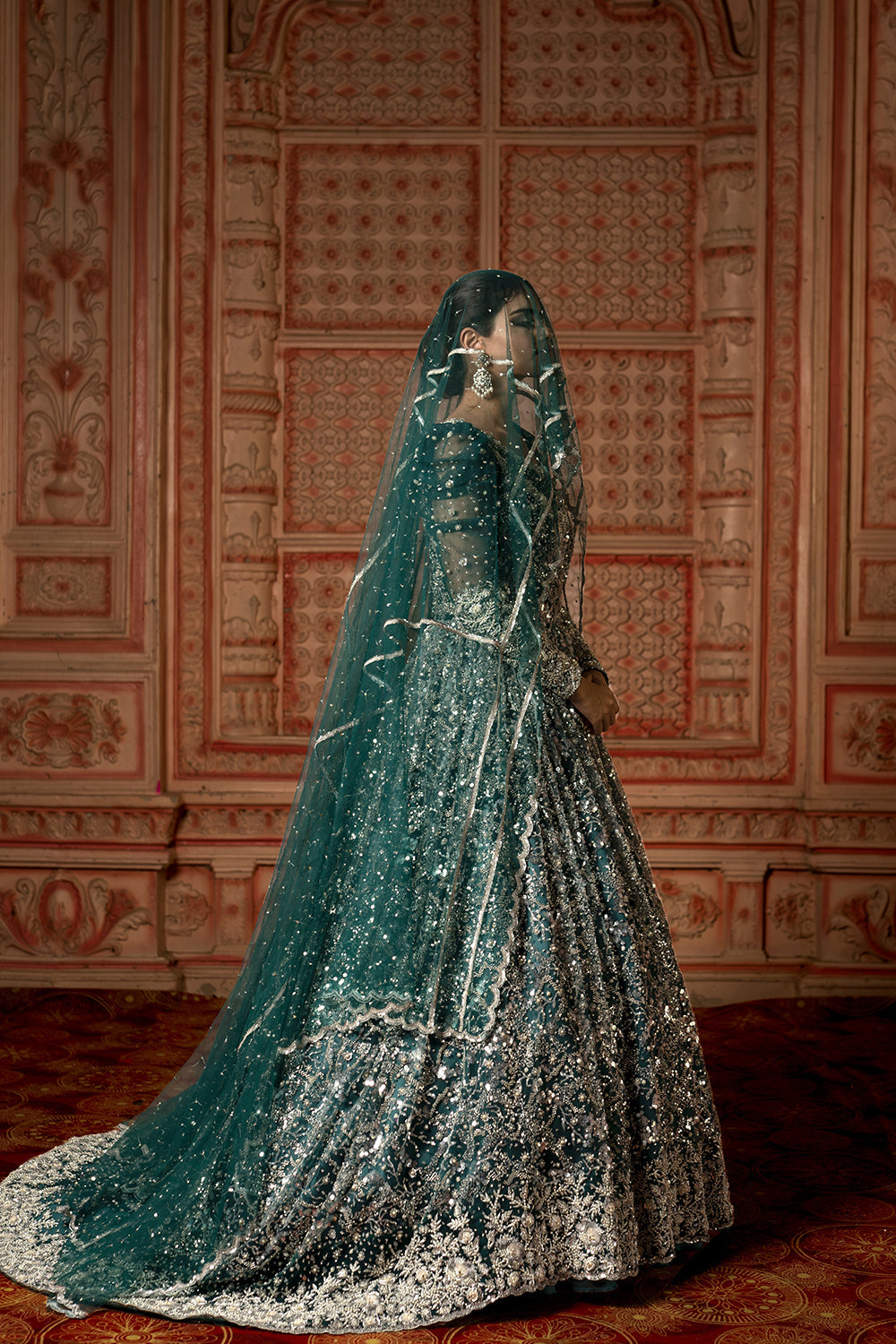 Emerald Green Sequin Trail Gown.