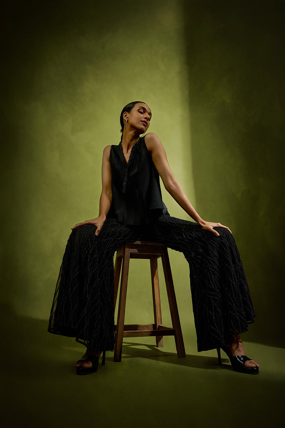 Noir Short Top Paired with Pearl Embellished Pants