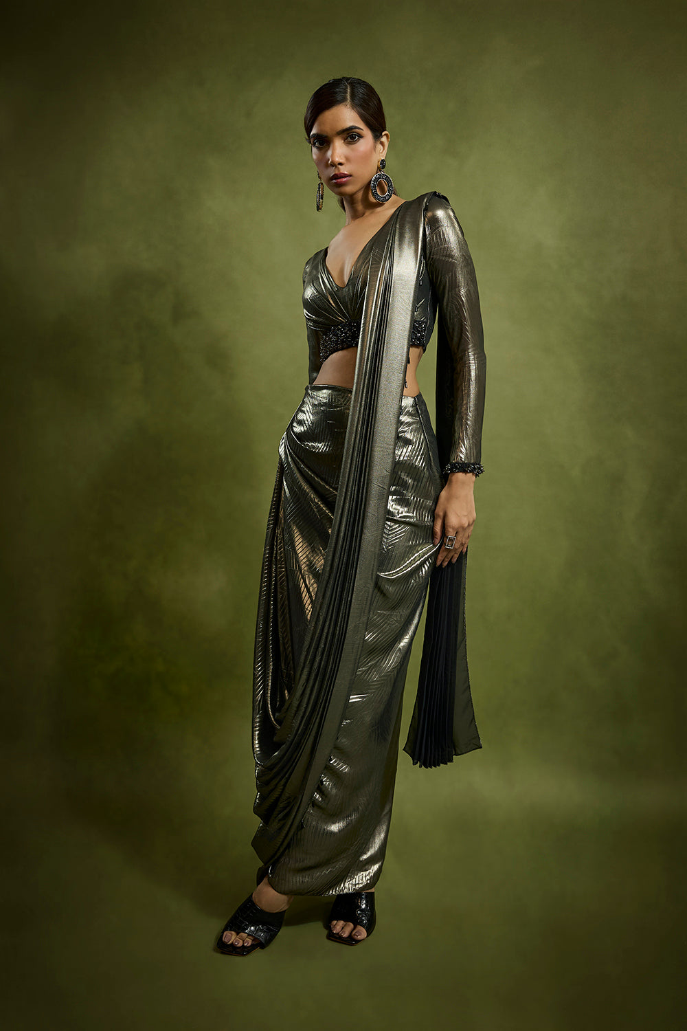 Embossed Drape Saree Teamed with Full Sleeves Blouse