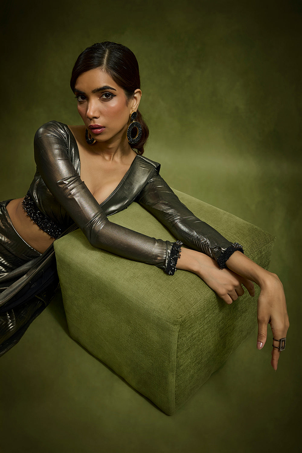 Embossed Drape Saree Teamed with Full Sleeves Blouse