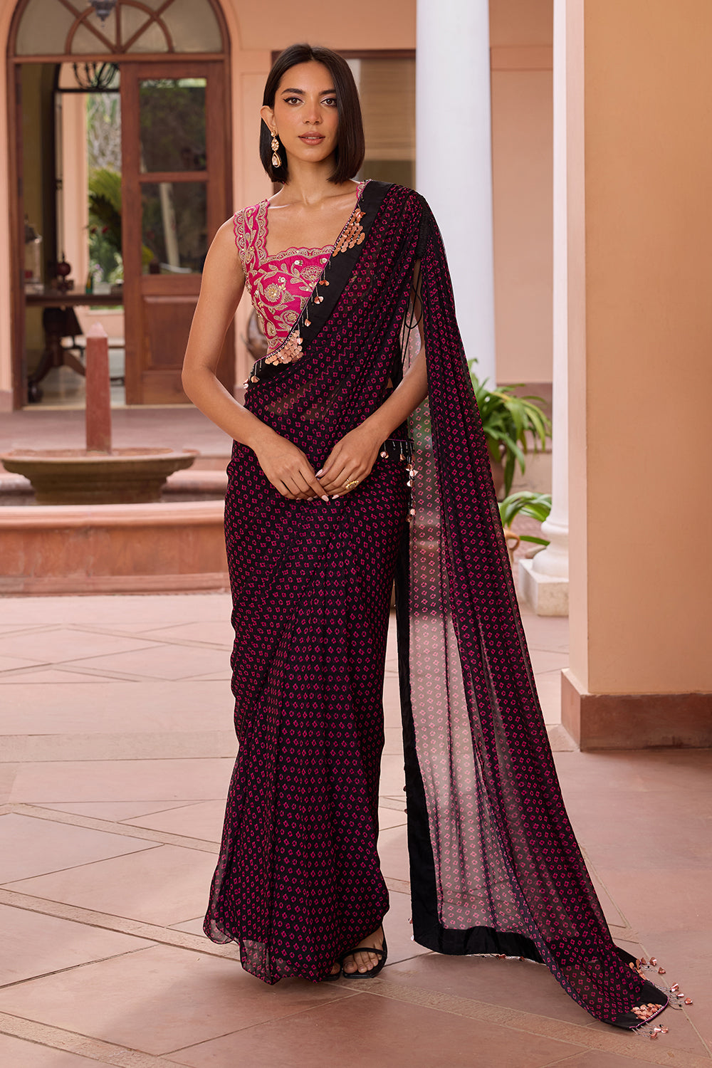 Black bandhani printed pre stitched saree with embroidered pink blouse
