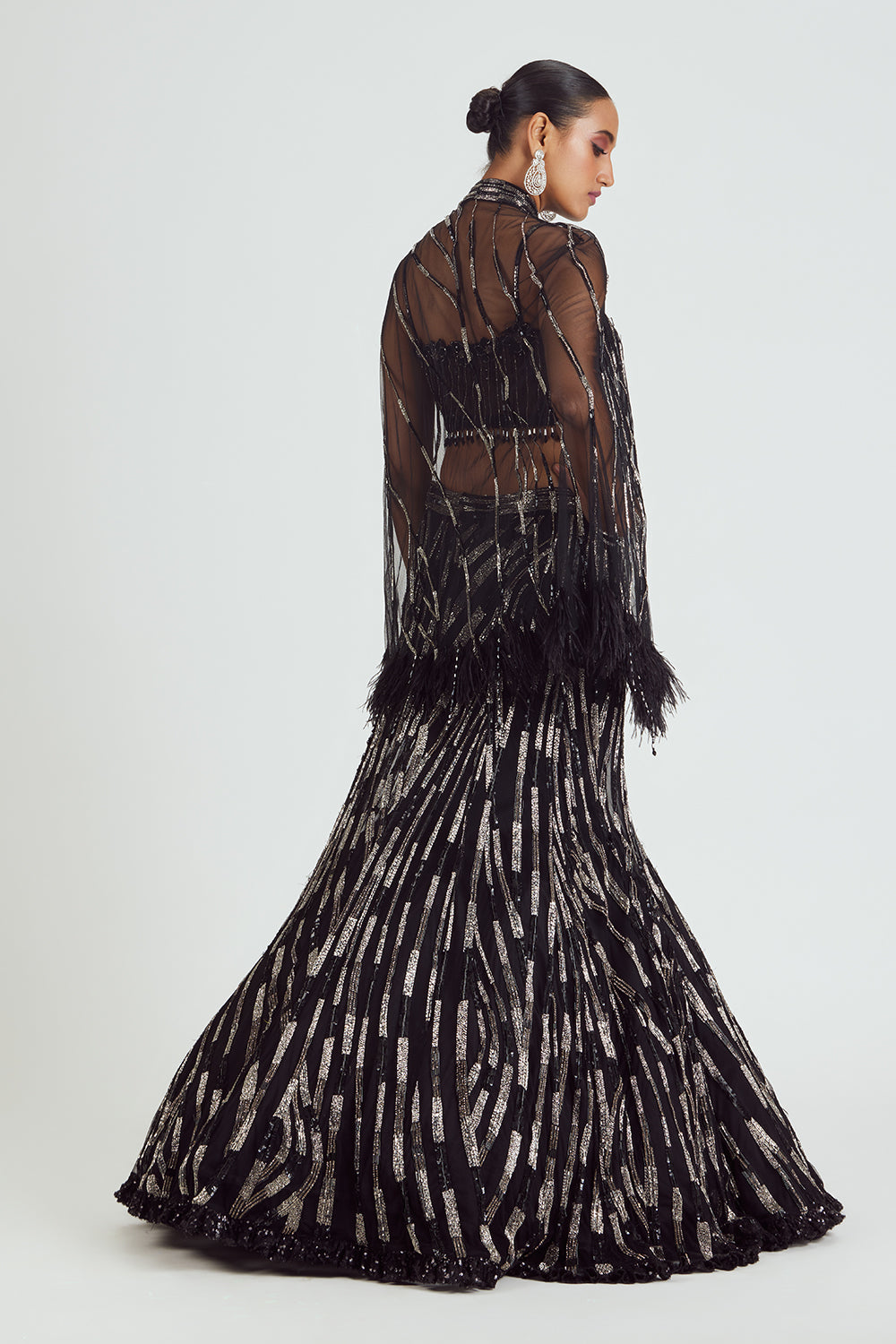 Black Net Fishtailed Skirt And Blouse With Cape