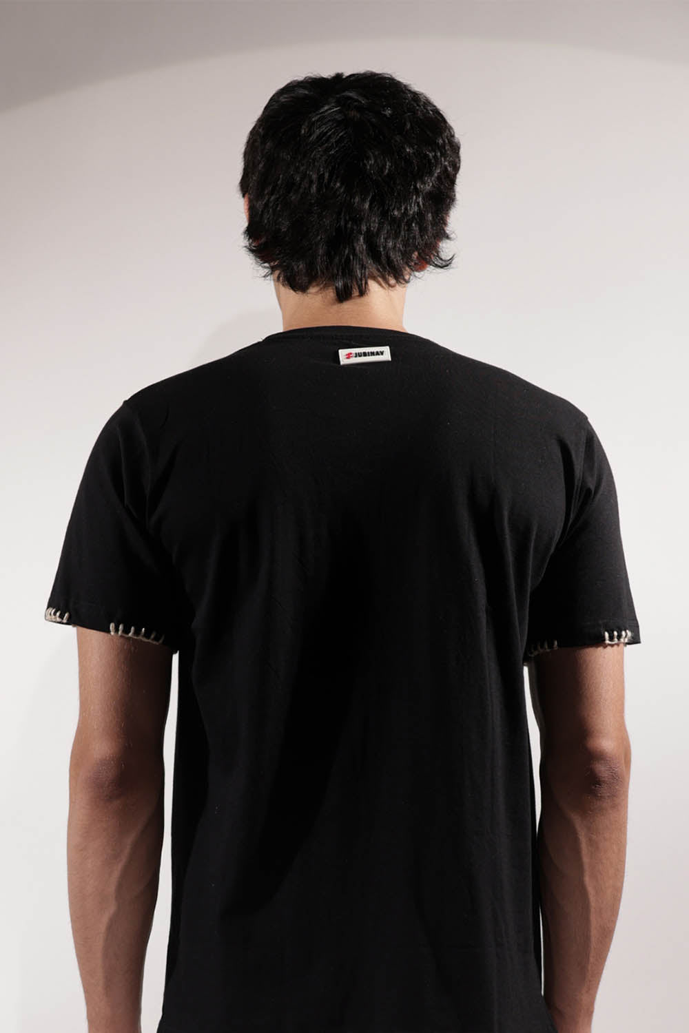 Black T-shirt with Valley-inspired patchwork