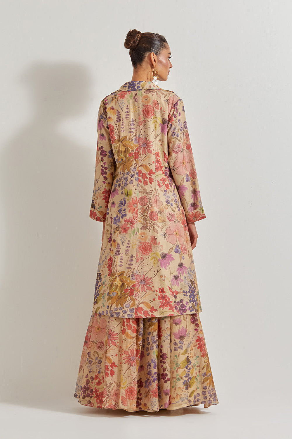 Blooming Burst Tissue Chanderi Panelled Skirt Paired With Hand Emebellished Bustier And Long Jacket