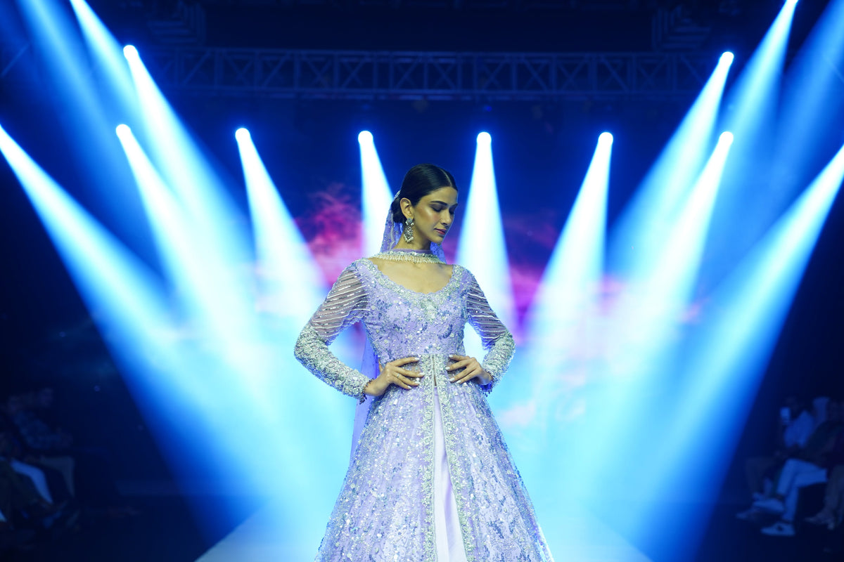 Lavendar gown with a trail