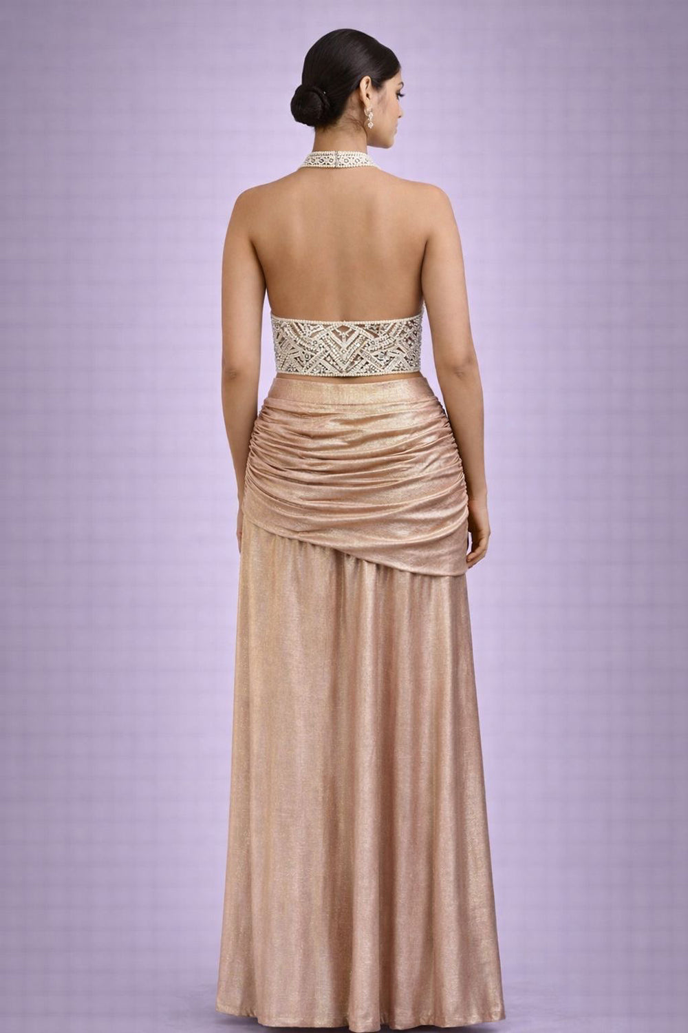 Drape skirt with embroidered pearl halter bloiuse