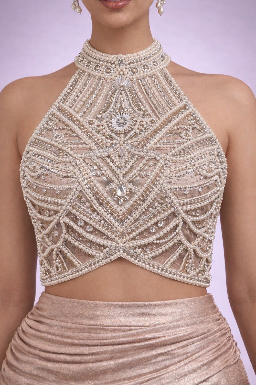 Drape skirt with embroidered pearl halter bloiuse