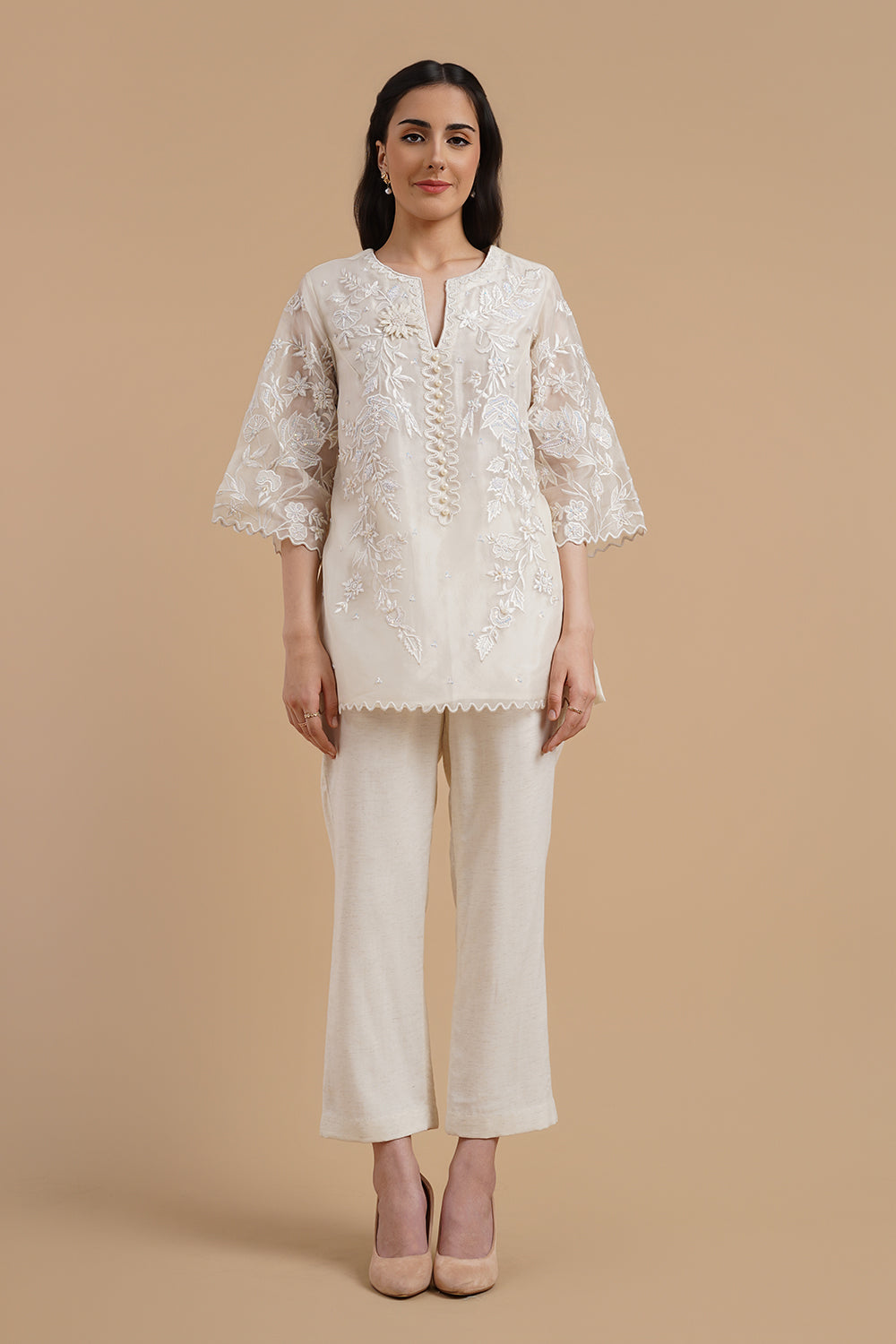 Embroidered Short Kurta Paired With Pants