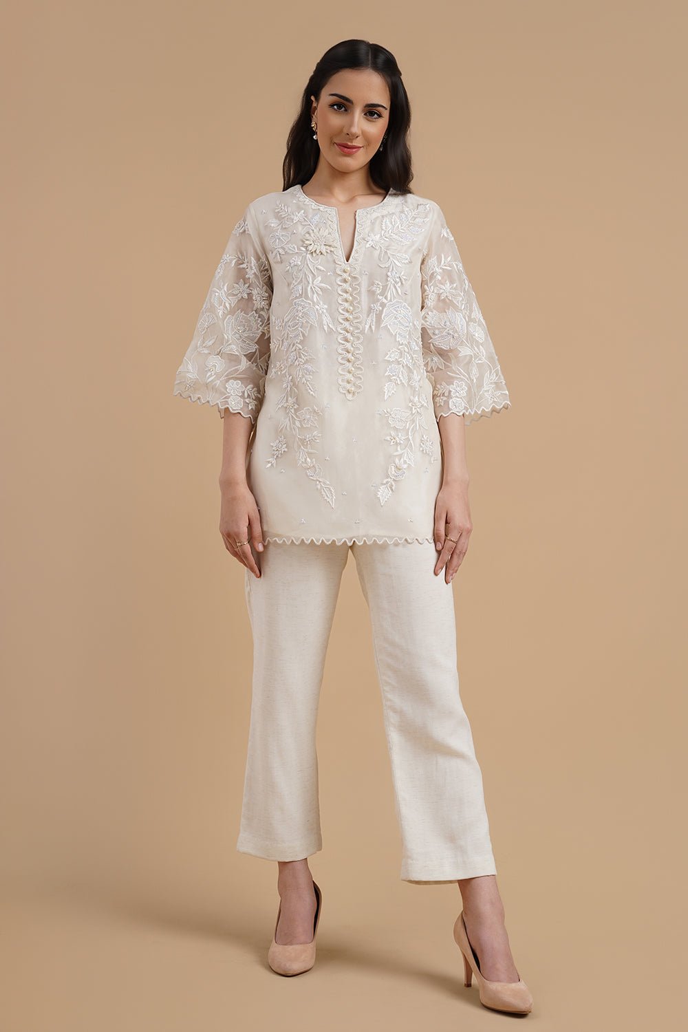 Embroidered Short Kurta Paired With Pants