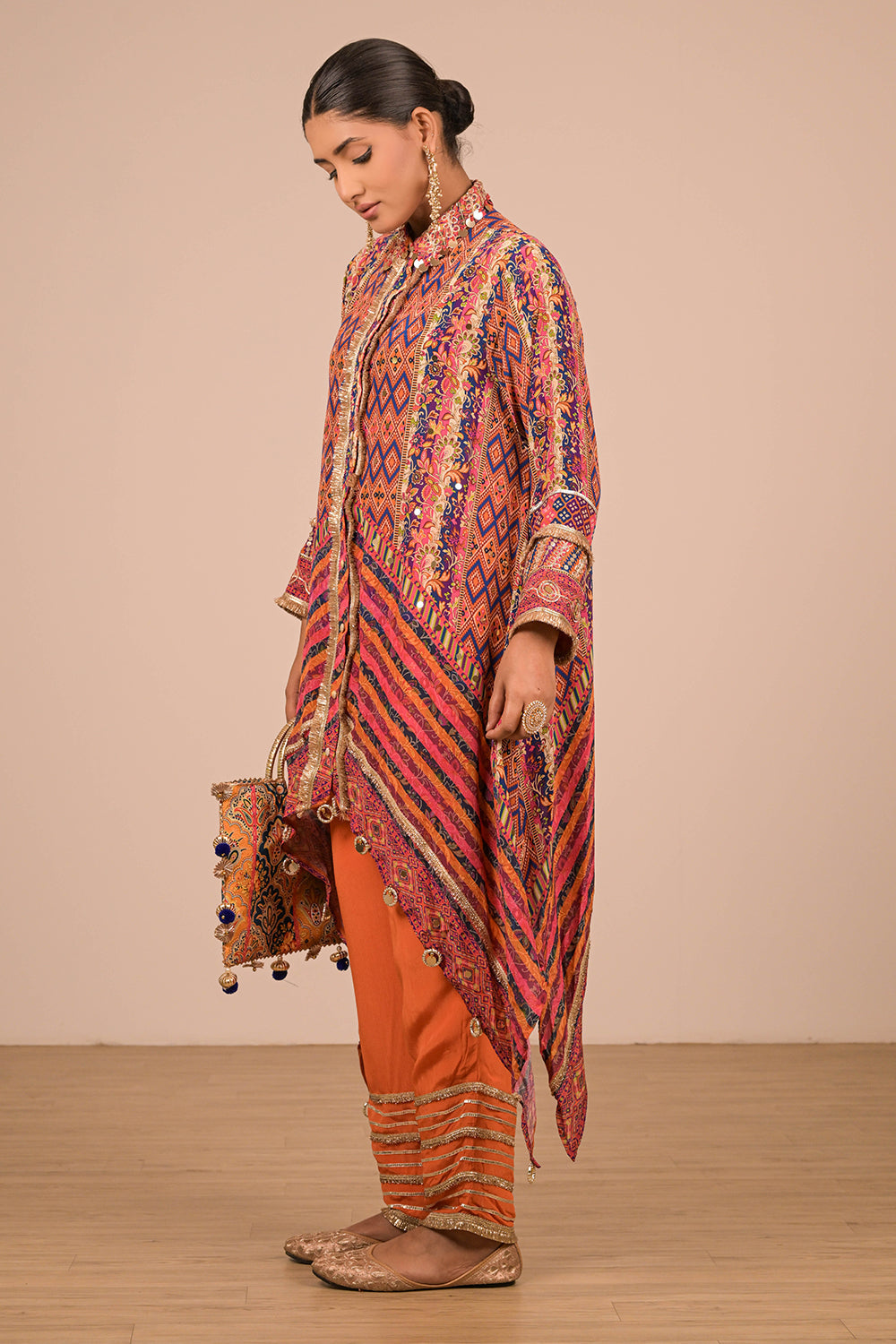 Asymmetrical Orange Kurta Set In Creope with Canvas Tote Bag
