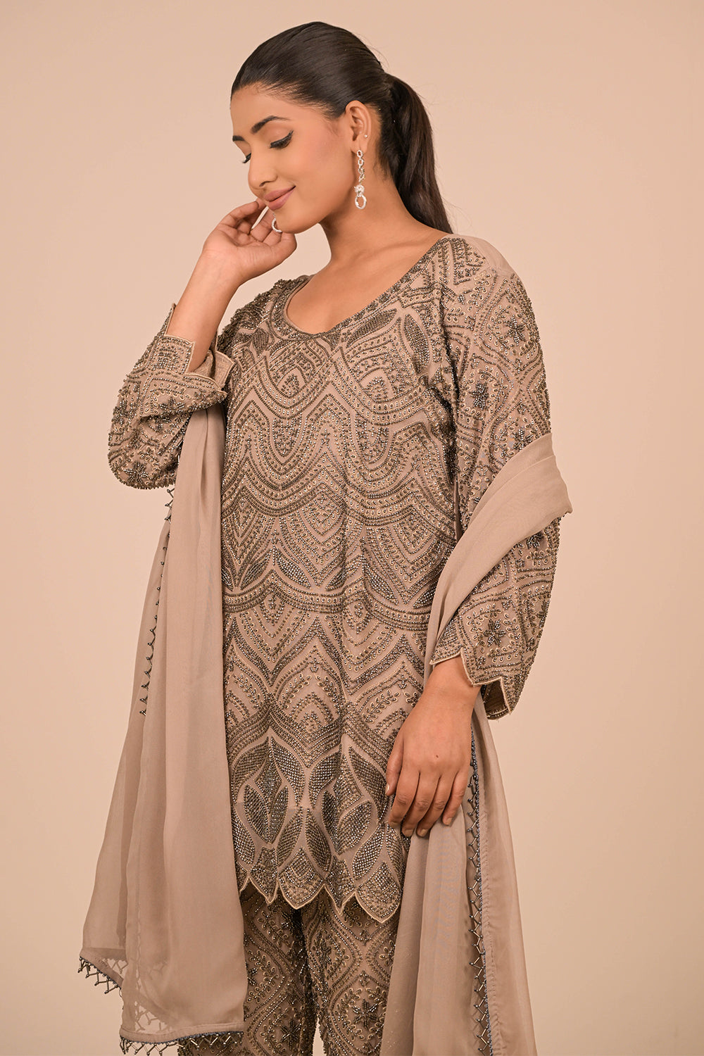 Green Georgette Suit Set with Intricate Moti Embroidery