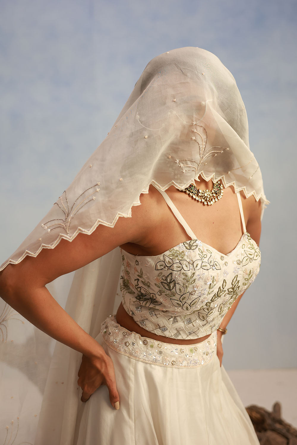 Ivory Bridal Lehenga With All-Over Sequin And Thread Embroidery