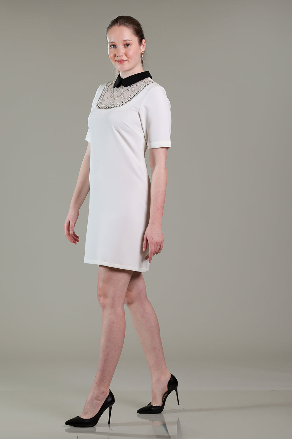 Ivory white dress with silver stones and crystals work on neck