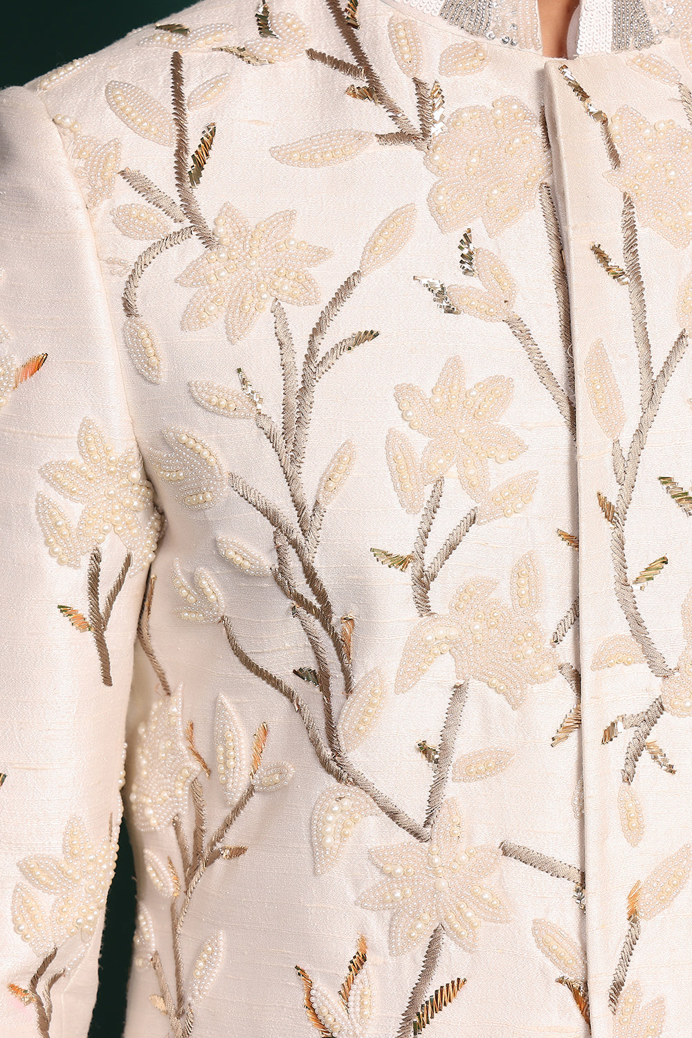 Ivory white raw silk sherwani with heavy embellished work