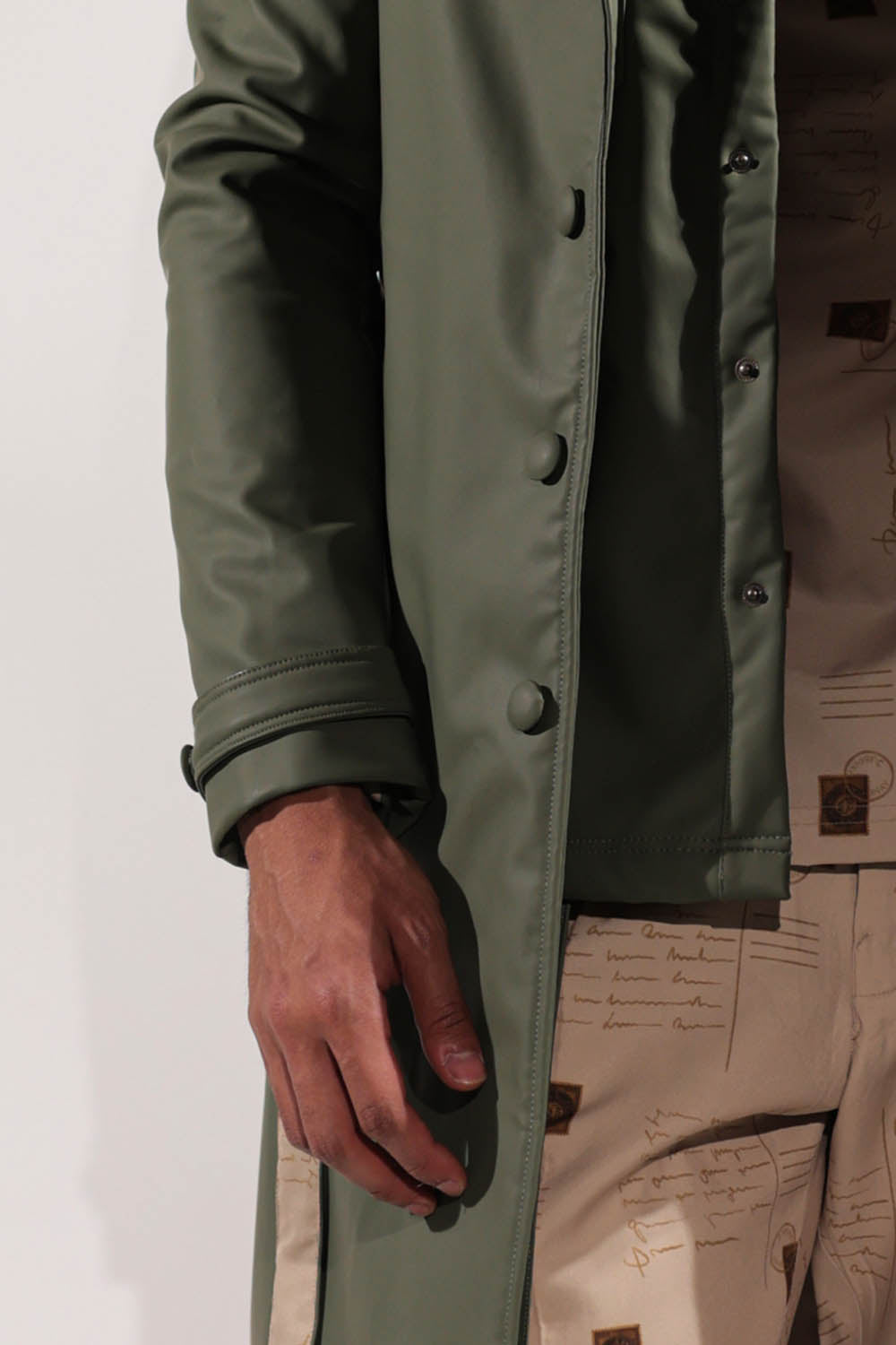 Leatherette green trench coat with belt
