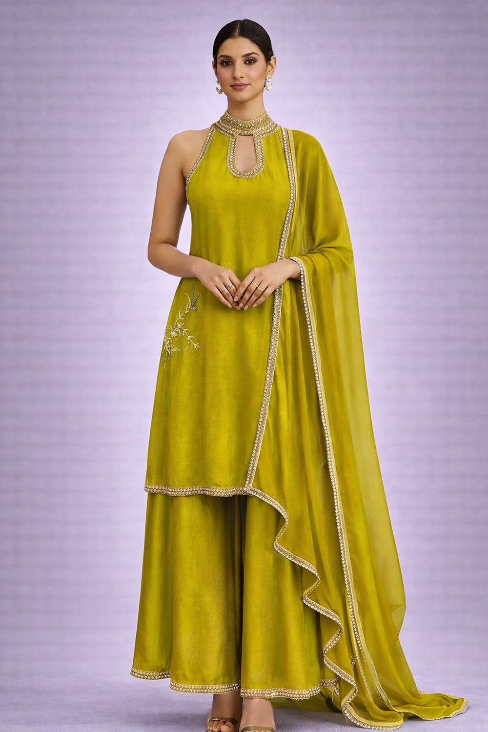 Lime Green Kurta Set with delicate embroidery on neck,and sides.