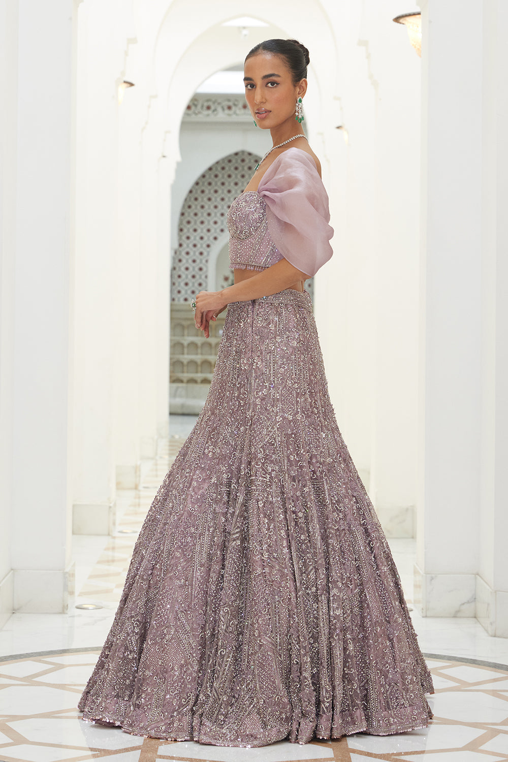 Mauve Net Fistailed Skirt With A Corsetted Blouse
