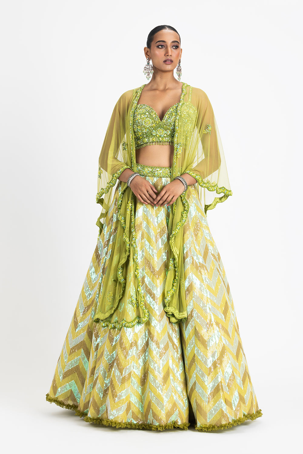 Mehndi Green Sequinned Lehenga With A Bustier And Net Cape