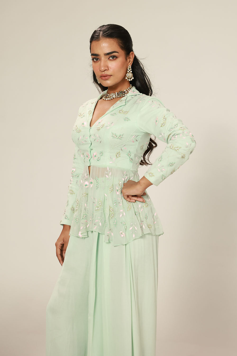 Mint Green Peplum-Style Top Paired With Flowy Wide-Leg Pants