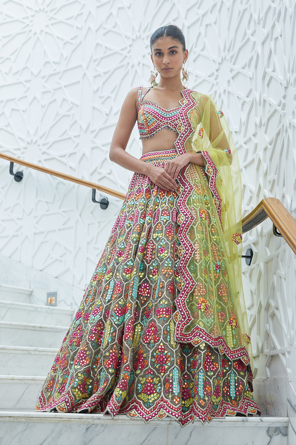 Mocca Organza Lehenga Choli With A Yellow Net Dupatta