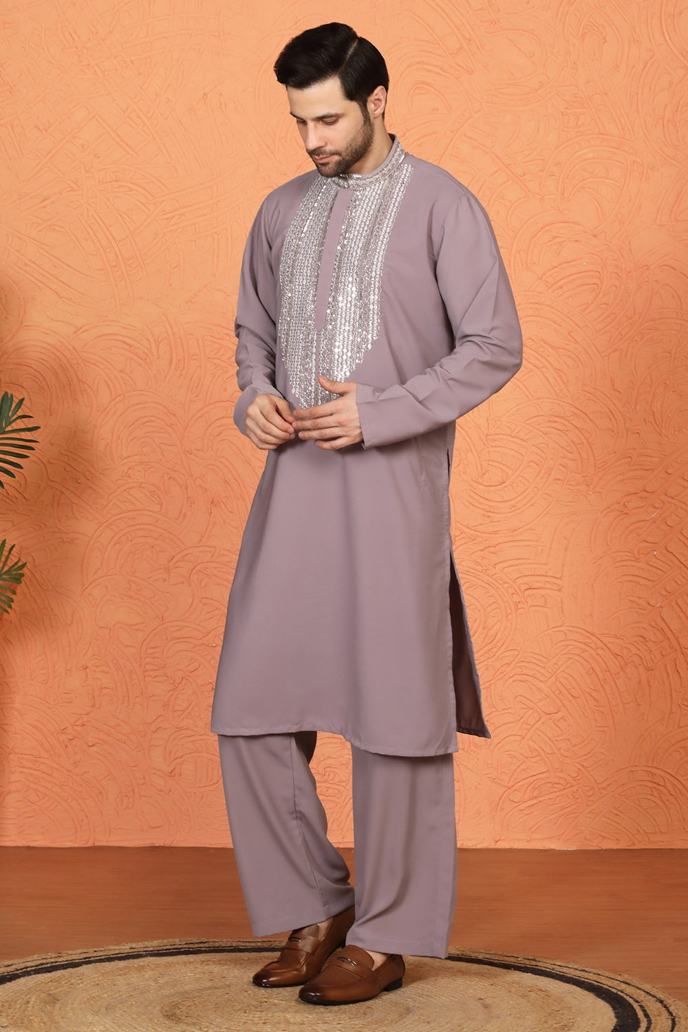 Nawaaz  Embroidered Kurta with Loose Fit Parallel Matching  Pants