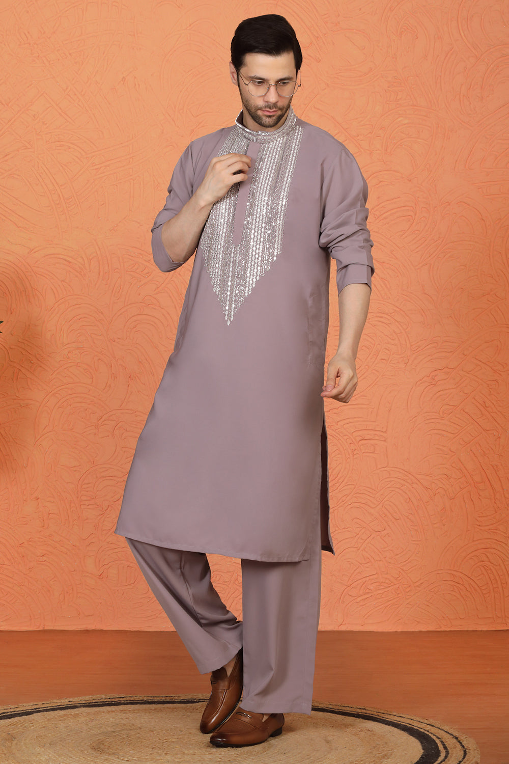 Nawaaz  Embroidered Kurta with Loose Fit Parallel Matching  Pants