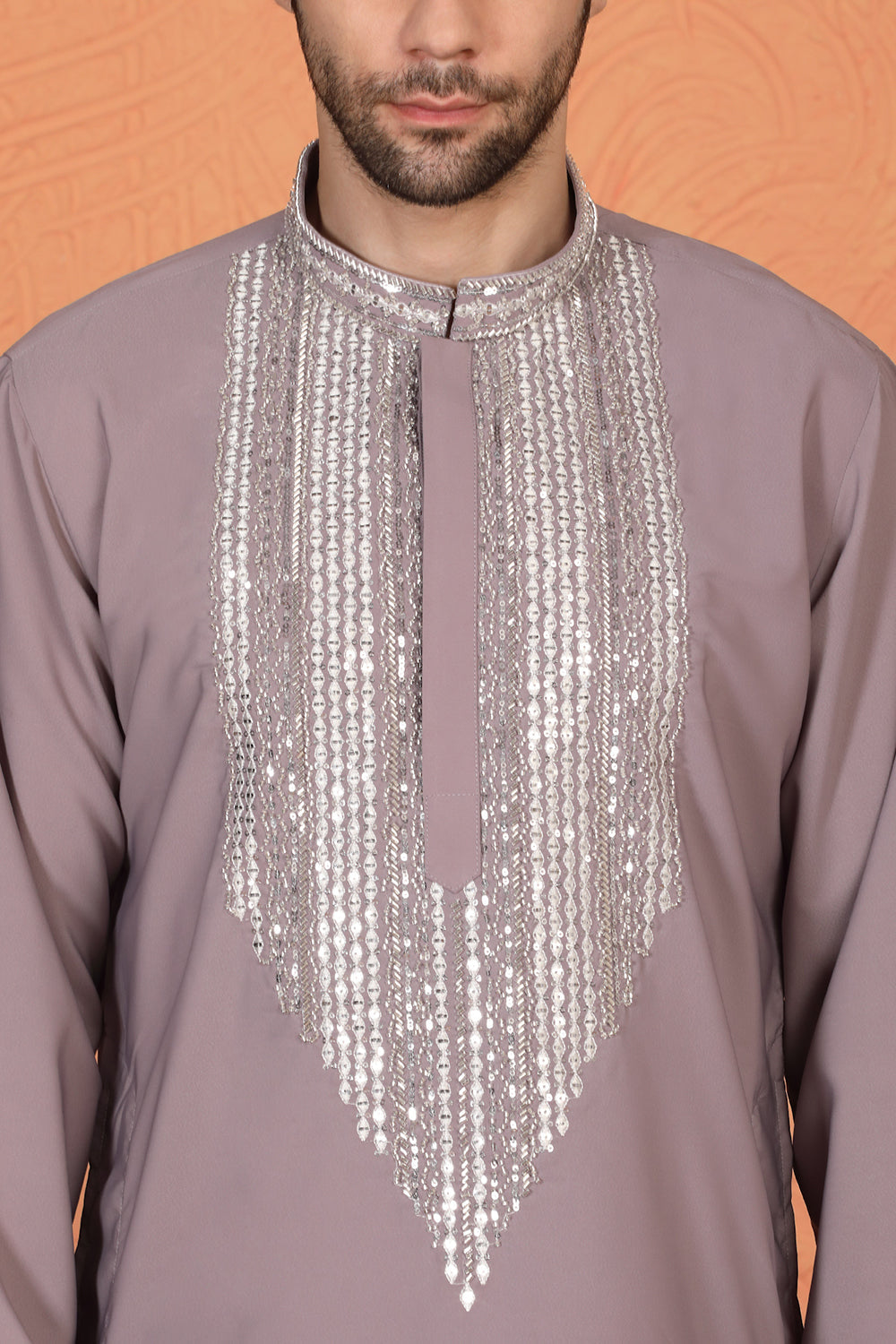 Nawaaz  Embroidered Kurta with Loose Fit Parallel Matching  Pants