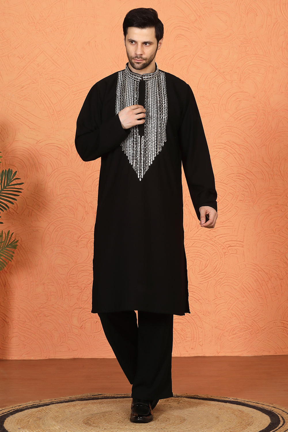 Nawaaz  Embroidered Kurta with Loose Fit Parallel Matching  Pants