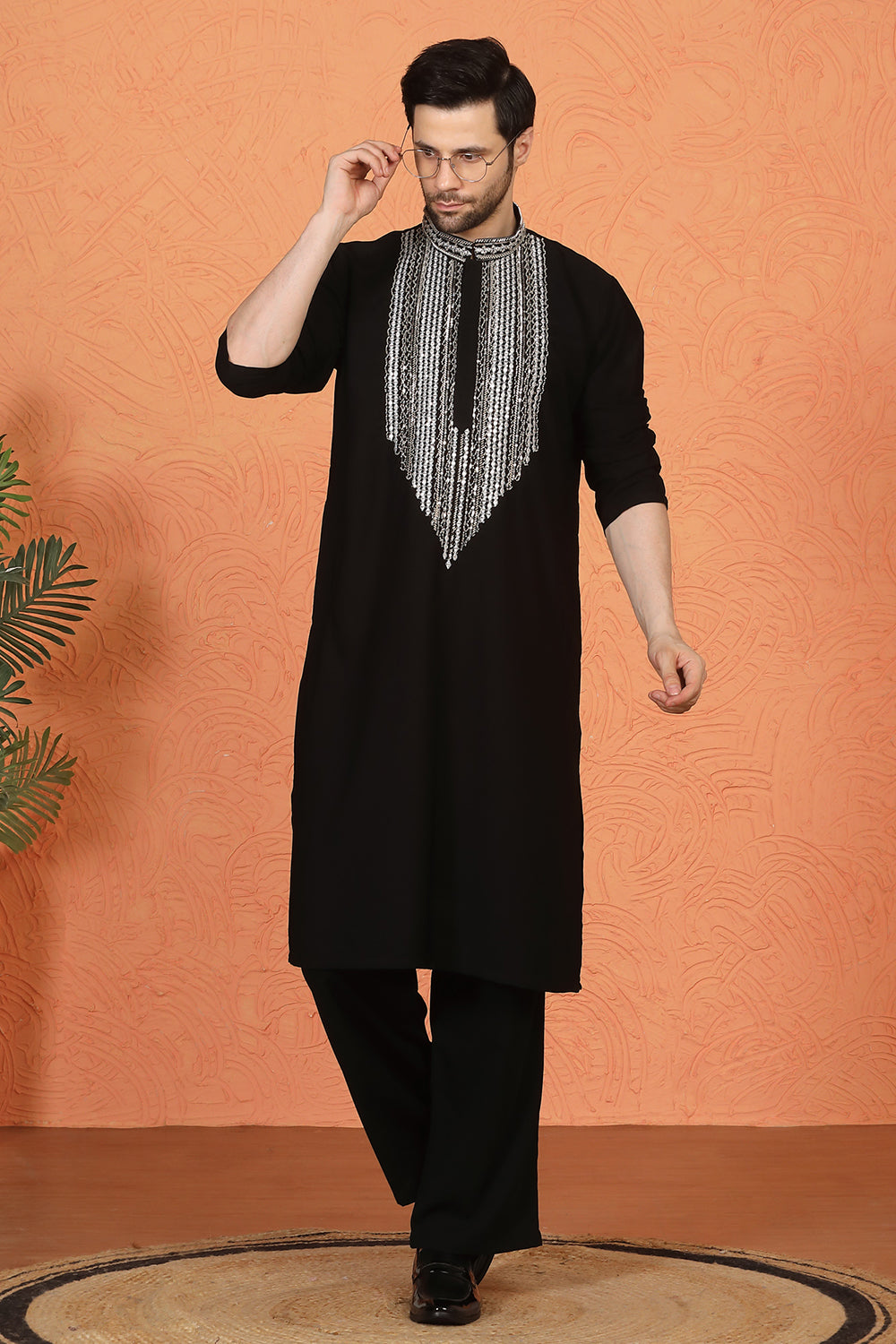 Nawaaz  Embroidered Kurta with Loose Fit Parallel Matching  Pants