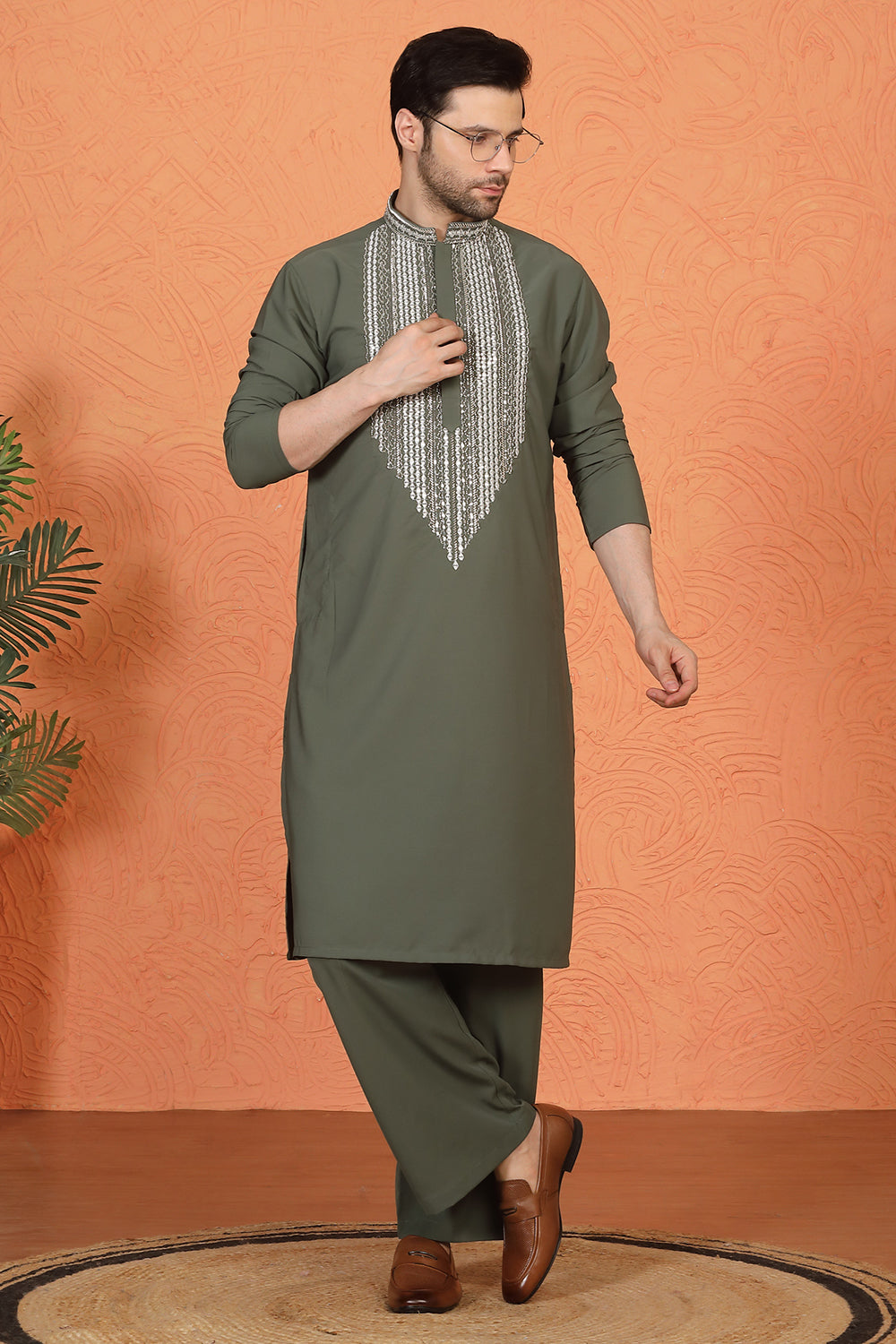 Nawaaz  Embroidered Kurta with Loose Fit Parallel Matching  Pants