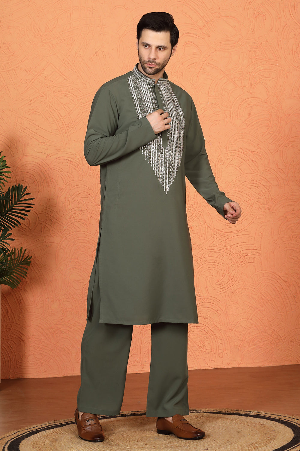 Nawaaz  Embroidered Kurta with Loose Fit Parallel Matching  Pants