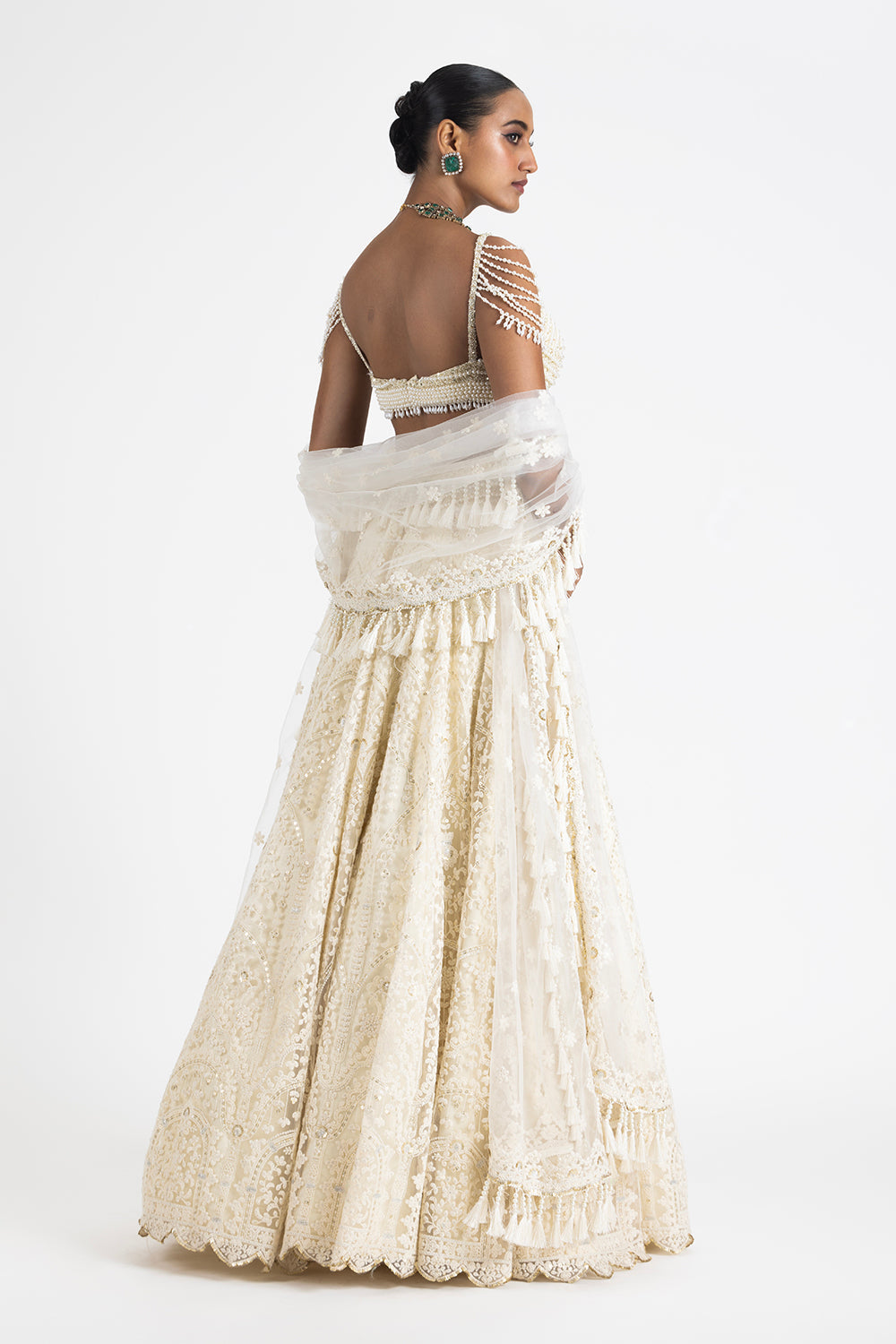 Off White Lehenga With A Pearl Embroidered Bustier And Duppata